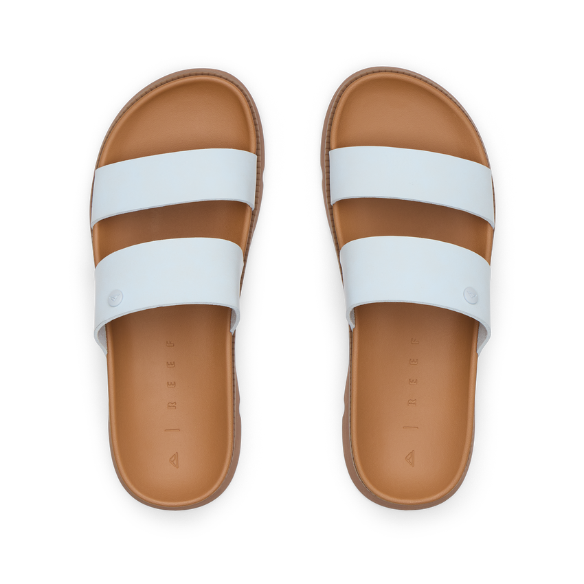 Vista Luxe Thea women's white strap sandals facing up, close-up of soft-rebound cushioned footbeds and arch support