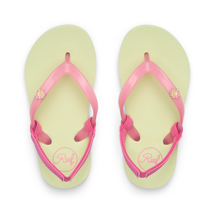 Little Charming girls' flip flops facing up, pink straps with flower detail, lime footbed, comfort focused design.