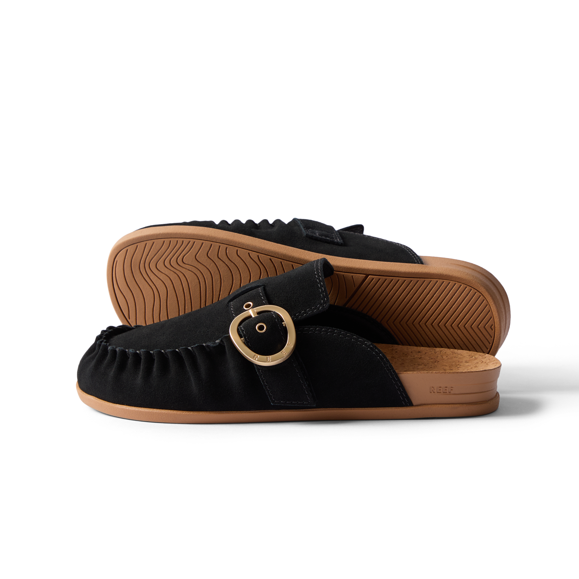 Vista Siena black suede clogs facing left, side view with buckle and textured soles