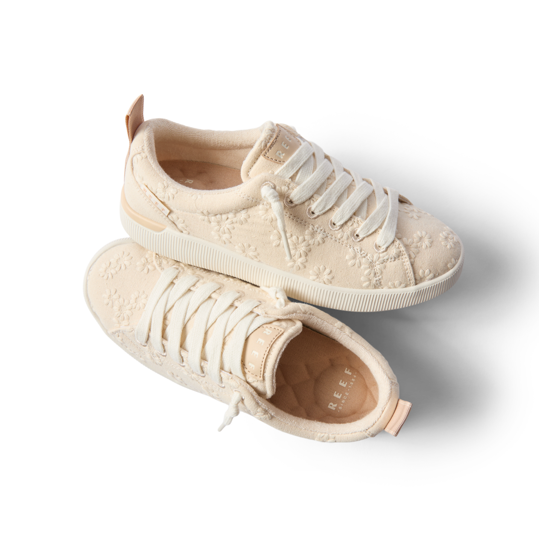Neptune Alana women's sneakers in light floral fabric, right shoe side view, left shoe top view, beach-inspired comfort design.