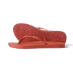 Side view of women's Cushion Slim flip flops in coral, showing sole and slim straps with arch support, water-friendly and comfortable.