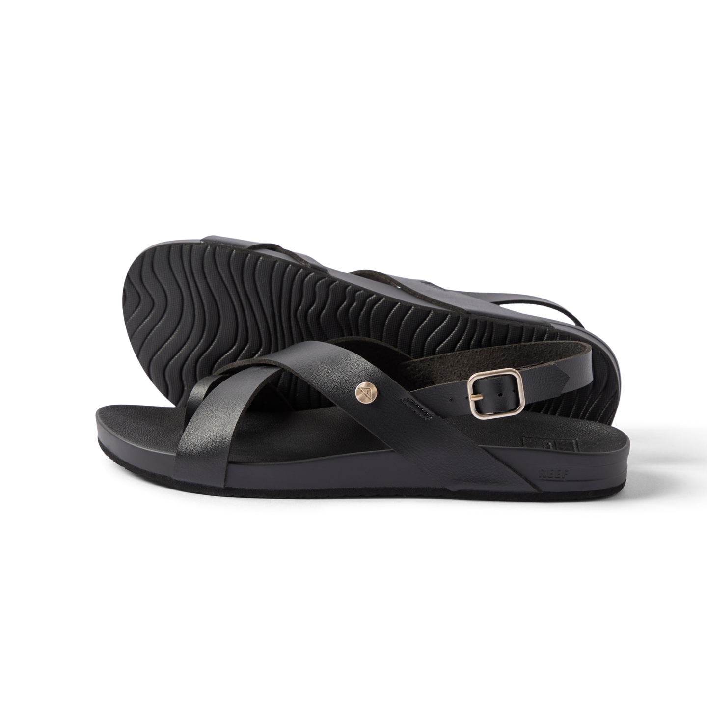 Vista Malia women’s black sandal side view facing right, showing adjustable strap and textured sole for beach comfort.