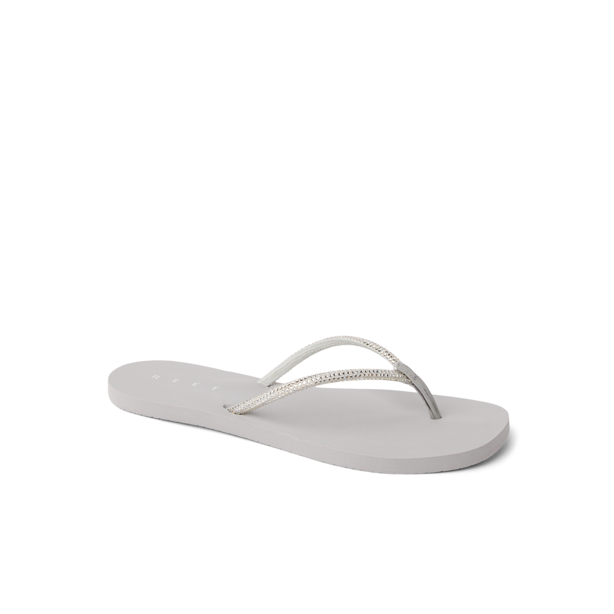 Bliss Bling Fling women's sandal facing left, close-up of cushioned sole and silver straps for beach comfort