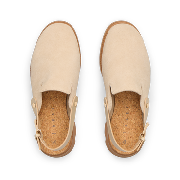 Vista Luxe Solene platform clogs facing upwards, showing soft suede upper and cork footbed for surf-inspired comfort.