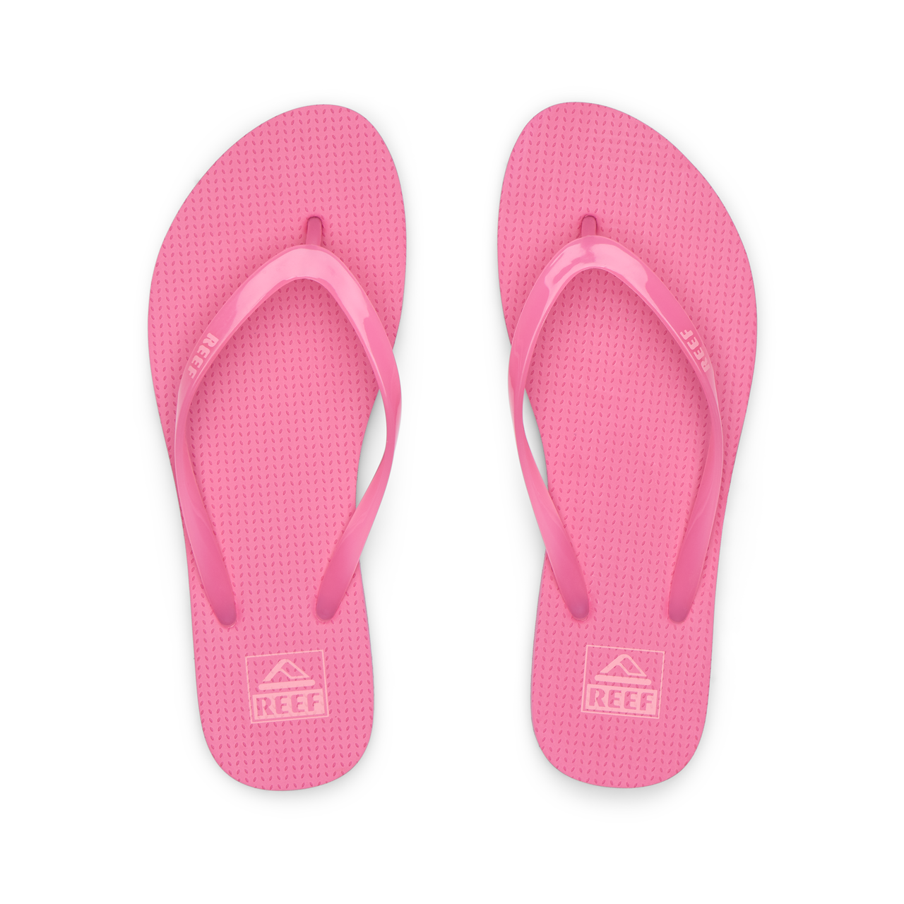 Kids Charming bright pink girls’ flip flops, top view, soft cushioning, water-friendly, beach-inspired comfort and durability.