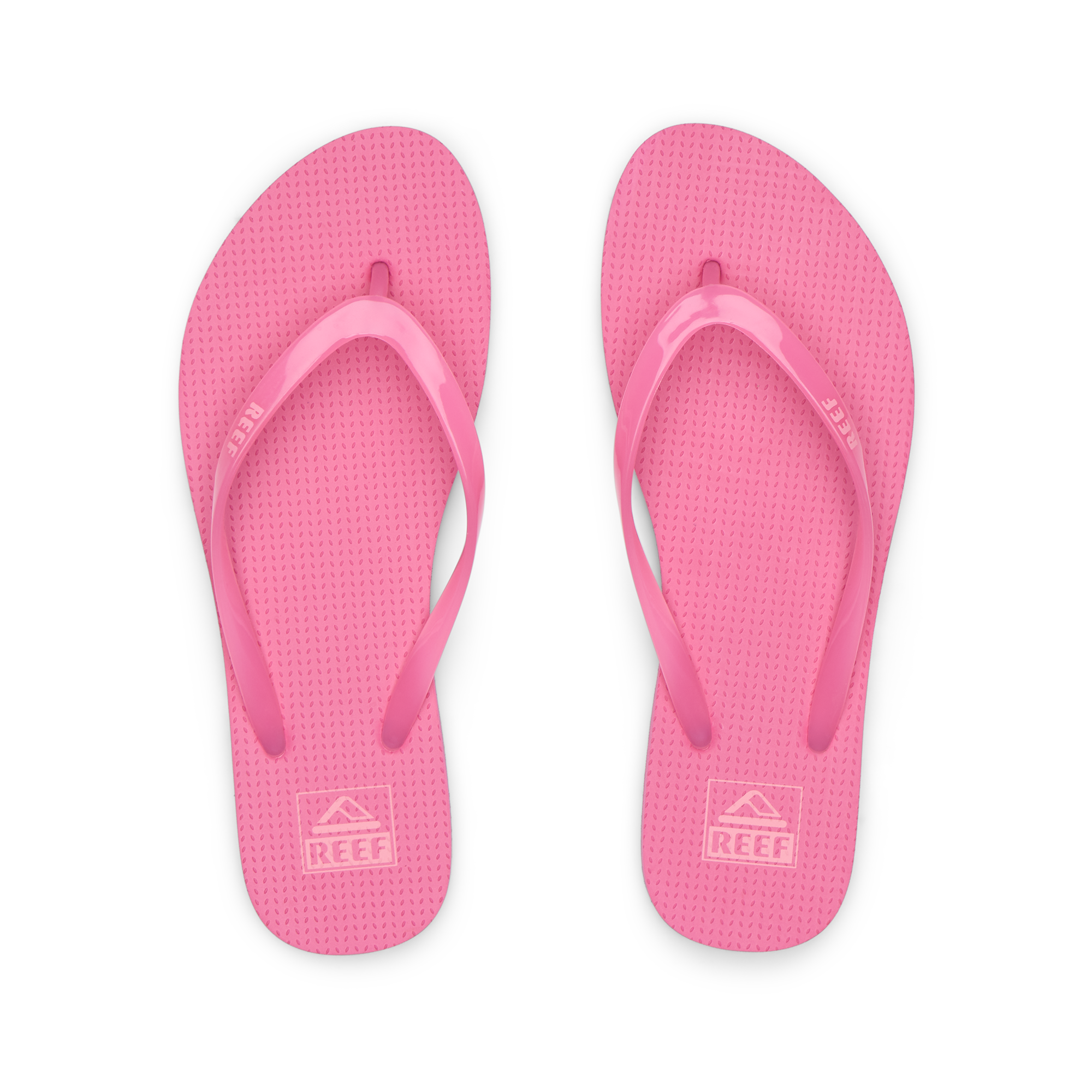 Kids Charming bright pink girls’ flip flops, top view, soft cushioning, water-friendly, beach-inspired comfort and durability.