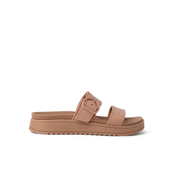Side view of a tan platform sandal facing right with an adjustable buckle strap and cushioned sole