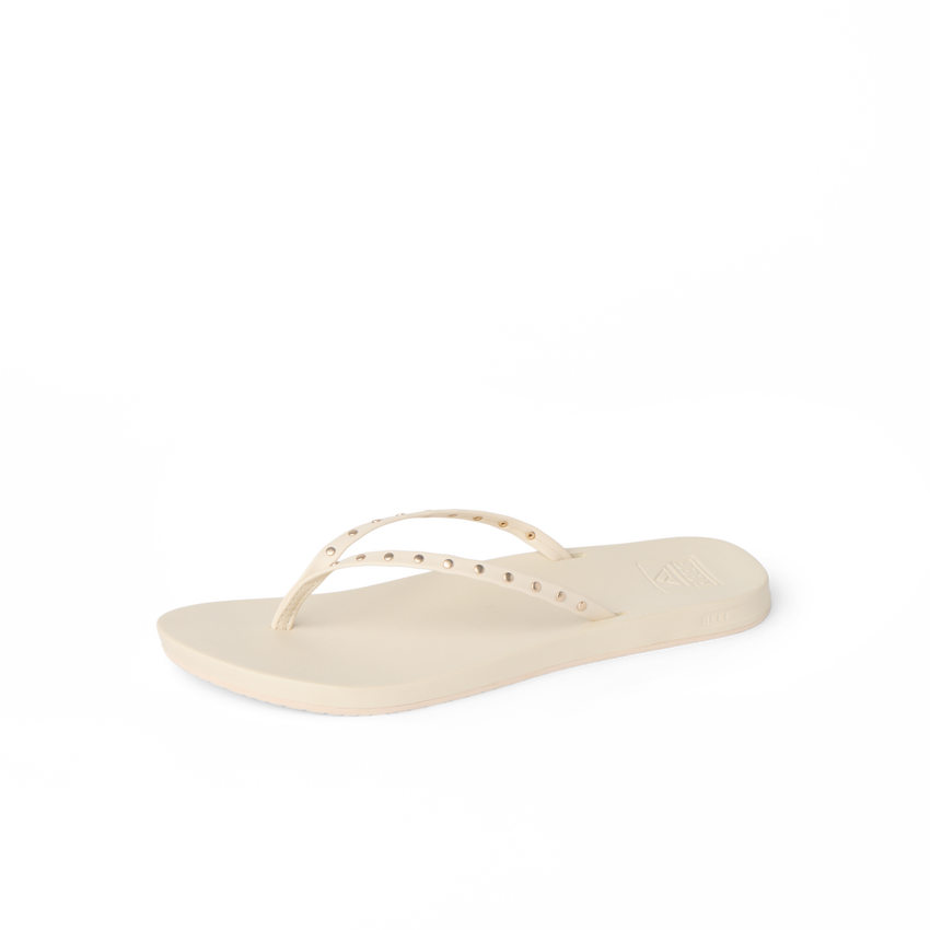 Cushion Slim Studs women's sandal facing left, featuring soft-rebound cushioning and studded straps for beach comfort.