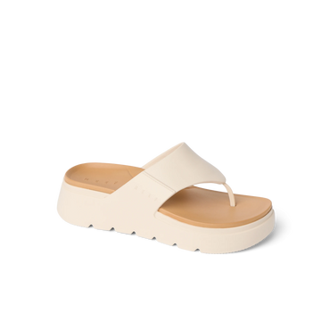 Cali Laguna sandal facing right, close-up of platform sole and cushioned toe post in white, beach-inspired comfort design