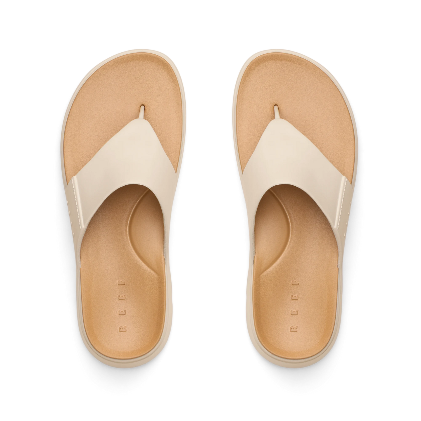 Top view of Cali Laguna white platform sandals facing upward, featuring extra cushioning and arch support, water-friendly design.