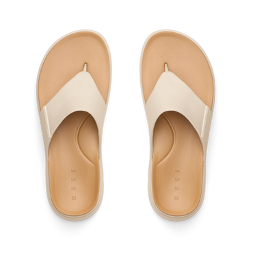 Top view of Cali Laguna white platform sandals facing upward, featuring extra cushioning and arch support, water-friendly design.