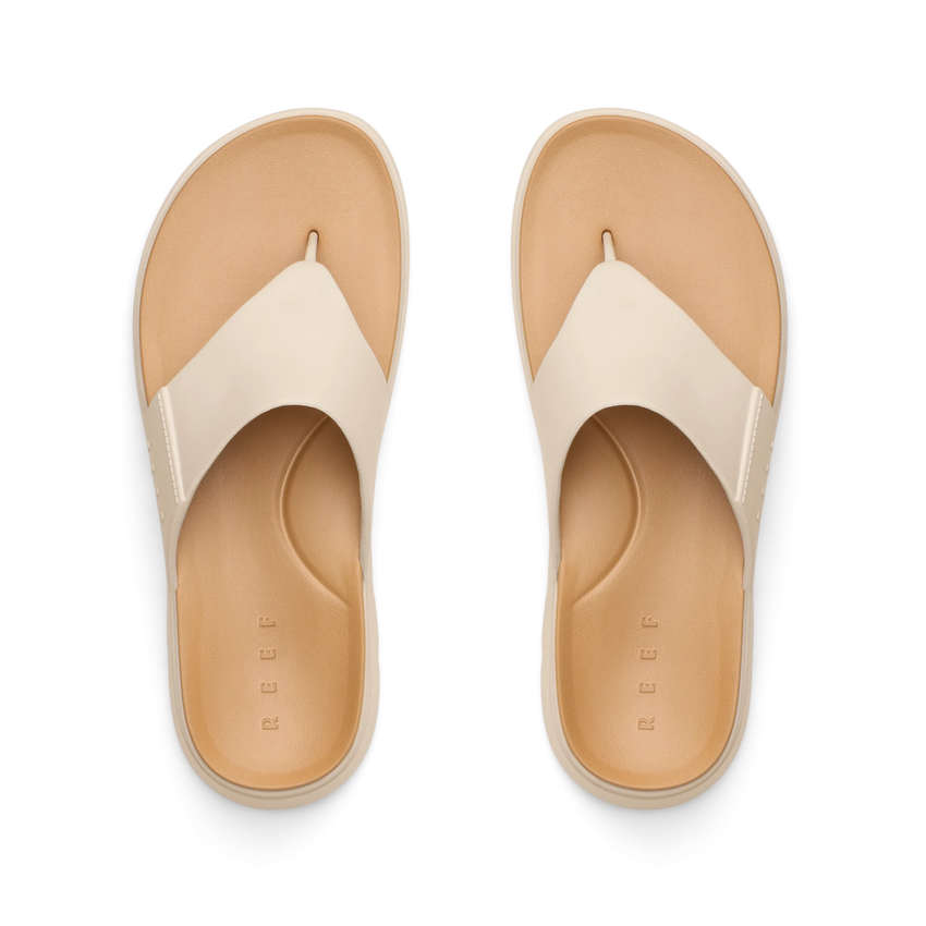 Top view of Cali Laguna white platform sandals facing upward, featuring extra cushioning and arch support, water-friendly design.