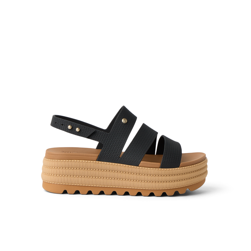 Water Vista Higher 2 women's sandal facing left, showing black straps and tan platform sole with cushioning and arch support.