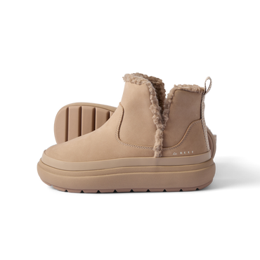 Pair of tan Weekend Autumn boots facing left with shearling lining, soft cushioning, and durable rubber sole by REEF.