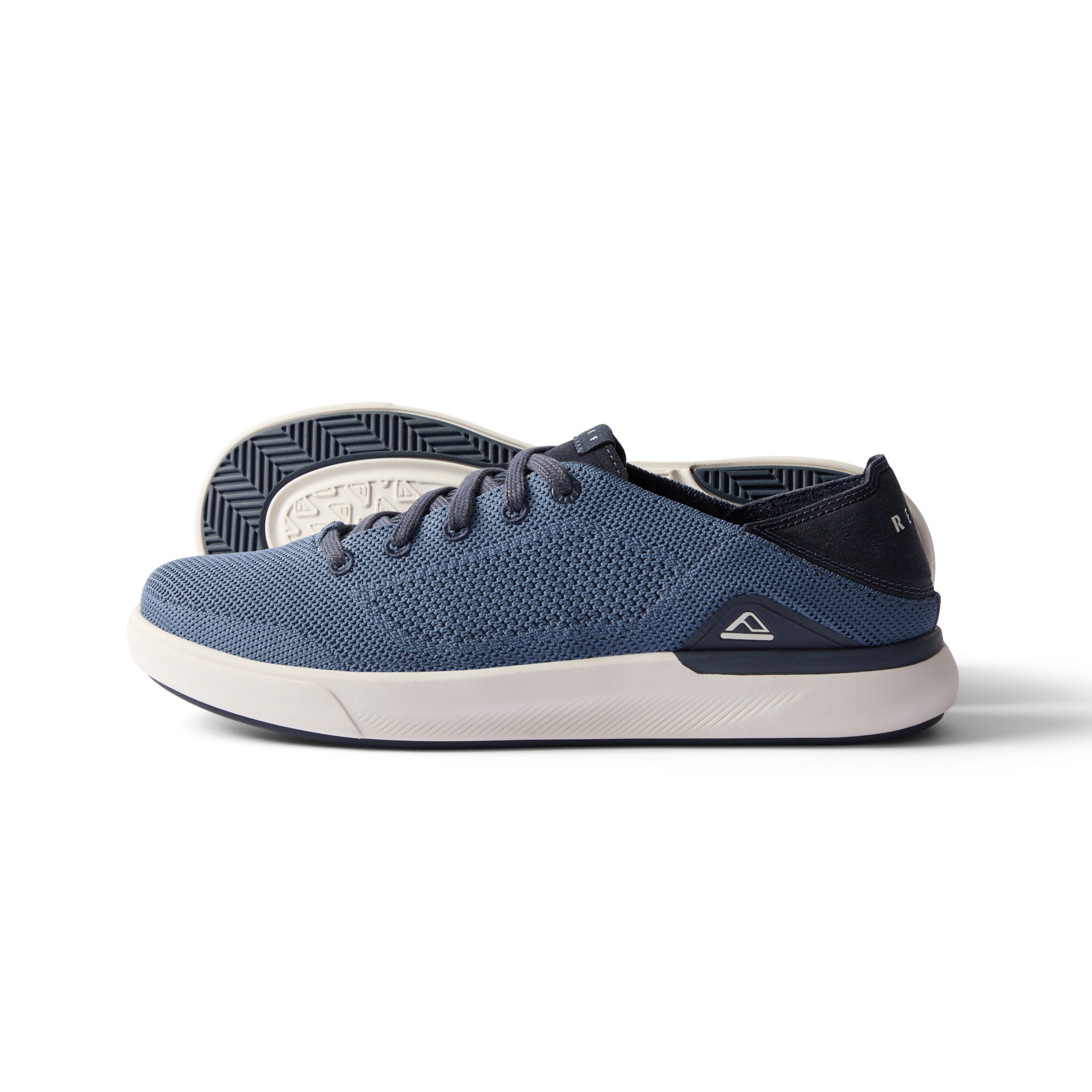 Neptune HT men's navy sneaker facing left showing side and sole, featuring extra cushion and REEF comfort technology.