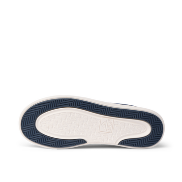 Bottom view of Neptune HT men's navy sneaker sole showing water-friendly, durable tread with arch support design