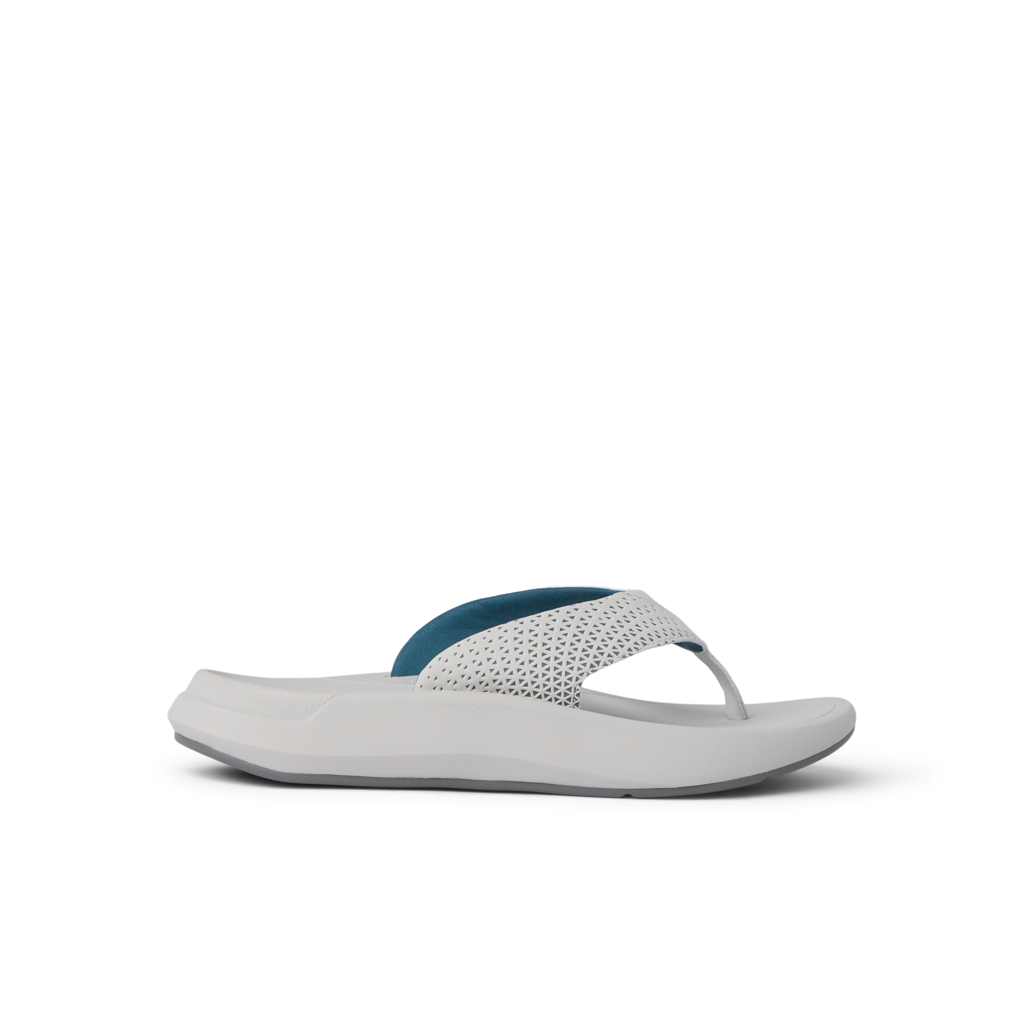 Side view of Rover + white and blue sandal with anatomical arch support and soft cushioning for beach comfort