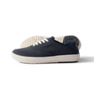 Side view of navy Neptune Lido men's sneaker with white sole, surf-inspired comfort and anatomical arch support.