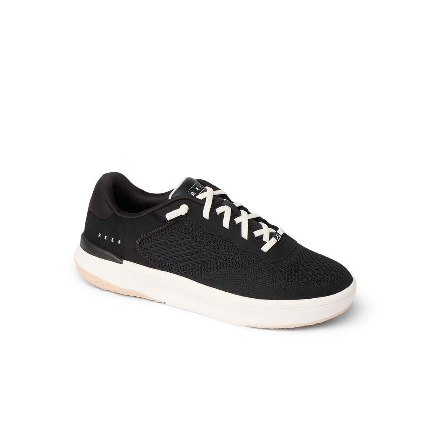 Reef Del Mar sneaker facing right, lightweight black mesh with anatomical arch support, soft cushioning, Vacation-Ready shoes.