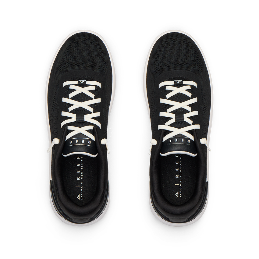 Top view of black Reef Del Mar shoes with white laces, designed for all-day comfort and beach-inspired active wear.