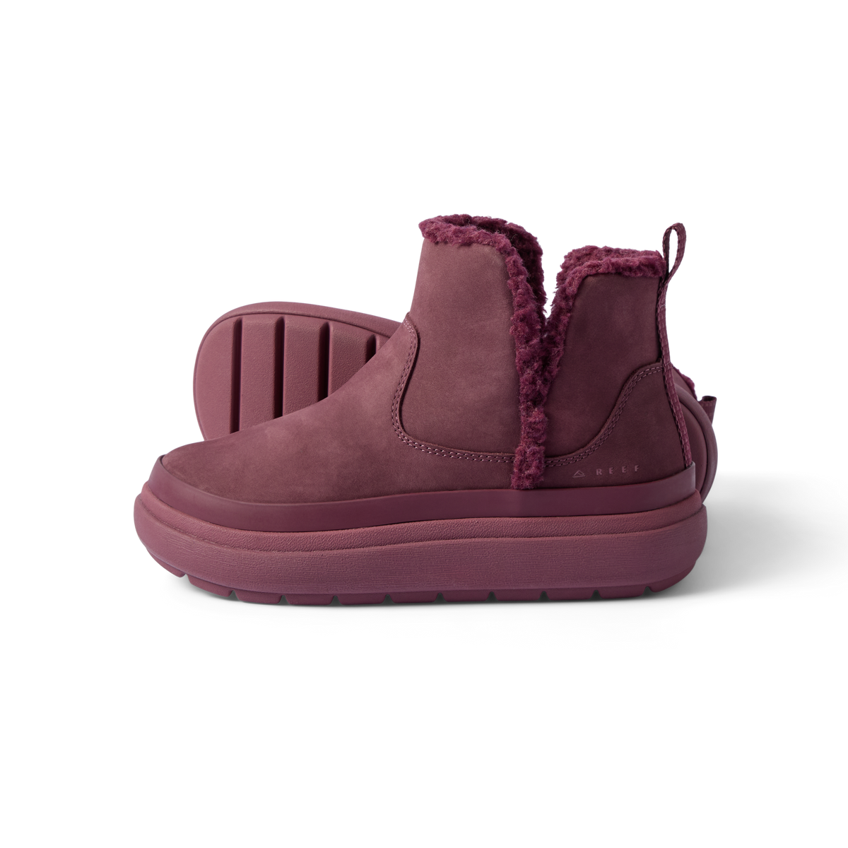 Side view of Weekend Autumn shoe in plum with cozy fleece lining, lightweight sole, and arch support by REEF, facing right.
