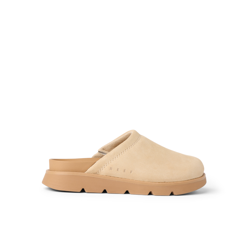 Vista Luxe Mariana clog in warm sand suede, left side view, showcasing closed-toe silhouette and contoured footbed for all-day comfort.