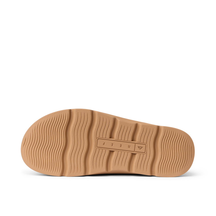Vista Luxe Mariana showing tan outsole with tread pattern and REEF branding, highlighting durable, lightweight comfort design.