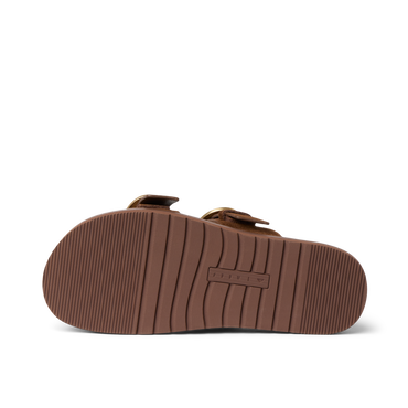 Vista Daphne sandal bottom sole facing up, showing durable tread pattern in chocolate brown, beach-inspired comfort slide