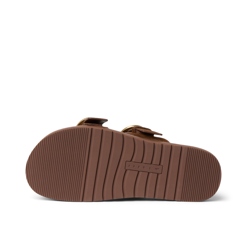 Vista Daphne sandal bottom sole facing up, showing durable tread pattern in chocolate brown, beach-inspired comfort slide
