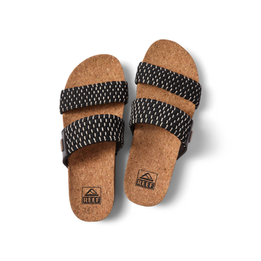 Top view of Cushion Vista women's sandals facing up with cushioned cork footbed and black textile straps for beach comfort.