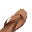 Vista Lune women's tan sandal facing right, close-up of cushioned toe post and footbed with arch support