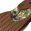Close-up of the rubber sole on the Fanning men's shoe facing upward, featuring extra cushioning and camouflage design.