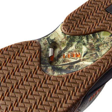 Close-up of the rubber sole on the Fanning men's shoe facing upward, featuring extra cushioning and camouflage design.