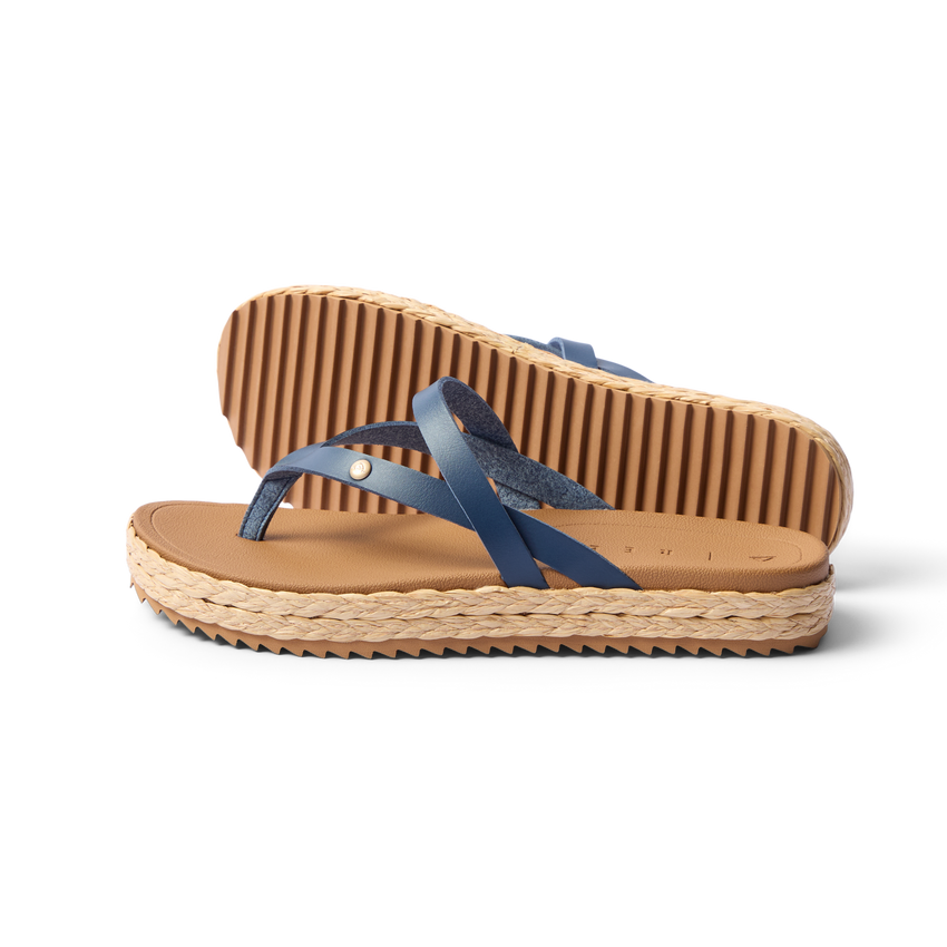 Vista Carmen women’s sandal side view facing left with navy straps, cushioned footbed, and textured sole for beach comfort.