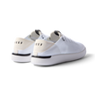 Reef Neptune white and black women's sneaker facing back right, featuring anatomical arch support and soft cushioning.