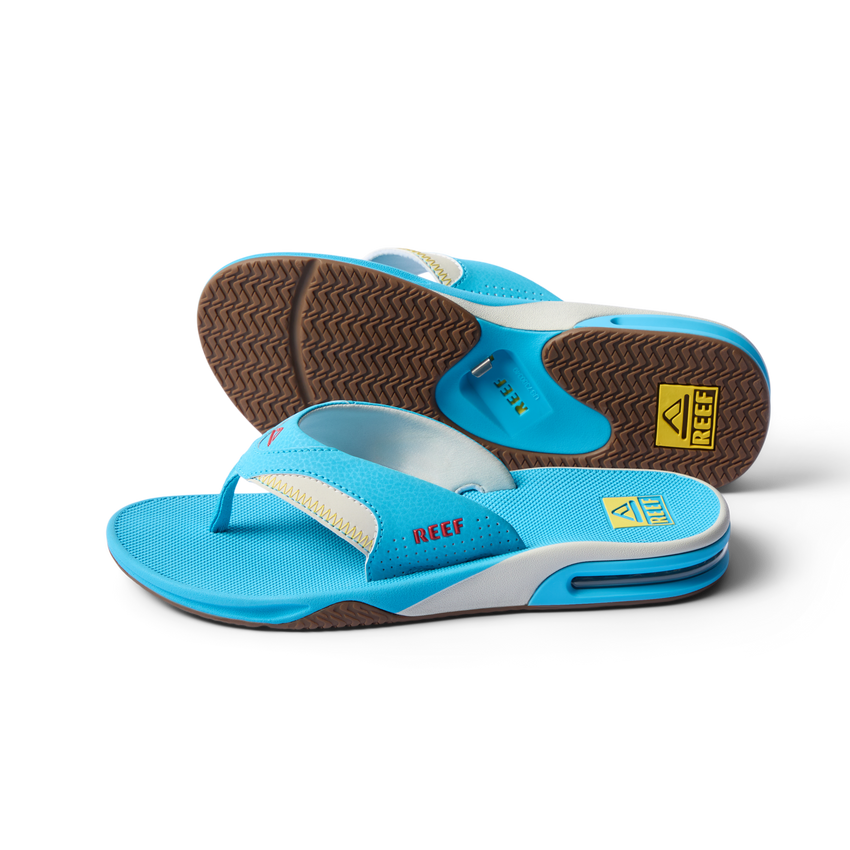Pair of men’s Fanning sandals in aquamarine, front facing with visible soft-rebound cushioning and arch support soles.