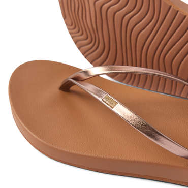 Close-up of Cushion Slim women's sandal facing left with bronze straps, showing soft cushioning and textured sole for comfort.