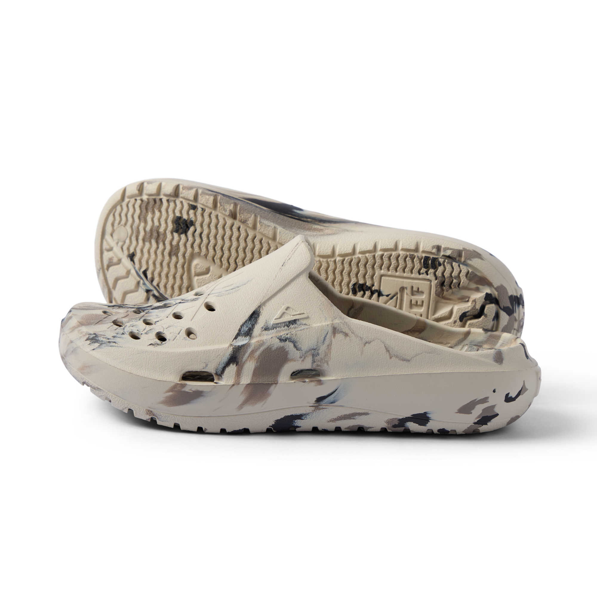 Glider water friendly clogs facing left, close-up of perforated toe, cushioned footbed, and textured outsole