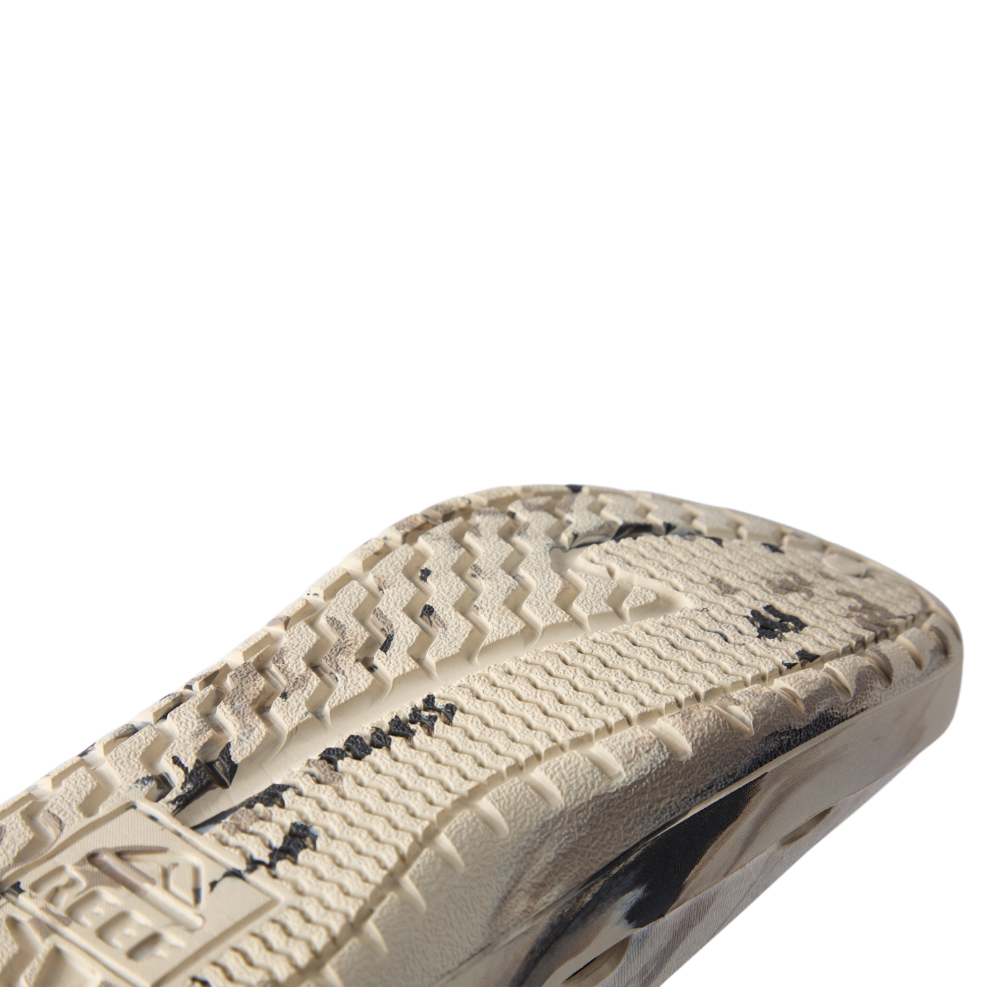 Glider close-up of the outsole facing right, showing textured traction and cushioned sole