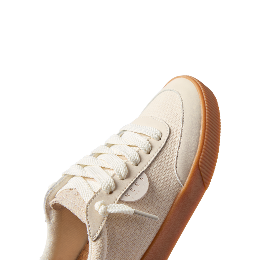 Lay Day Seas sneaker for women, facing right, close-up on upper and midsole, surf-inspired comfort with anatomical arch support.