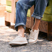 Lay Day Lite off white sneakers, one facing left and one facing forward, shown with cushioned comfort