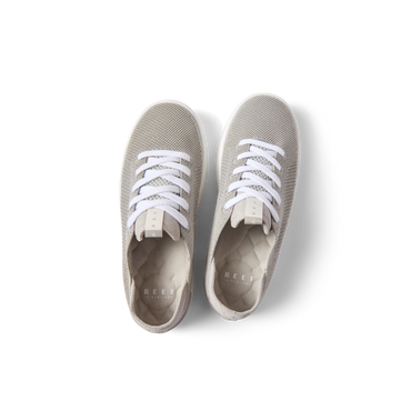 Top view of Reef Neptune women's lightweight sneakers in metallic silver with anatomical arch support and cushioning.