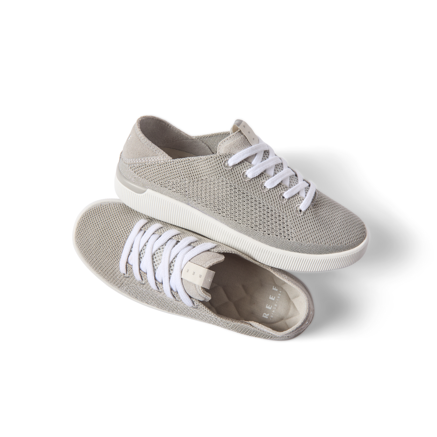 Reef Neptune lightweight women's sneakers in neutral breathable knit, left shoe facing right, right shoe top view showing cushioned insole.