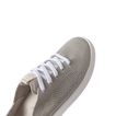 Reef Neptune women's sneaker facing forward, showing breathable knit upper with soft cushioning for beach comfort.