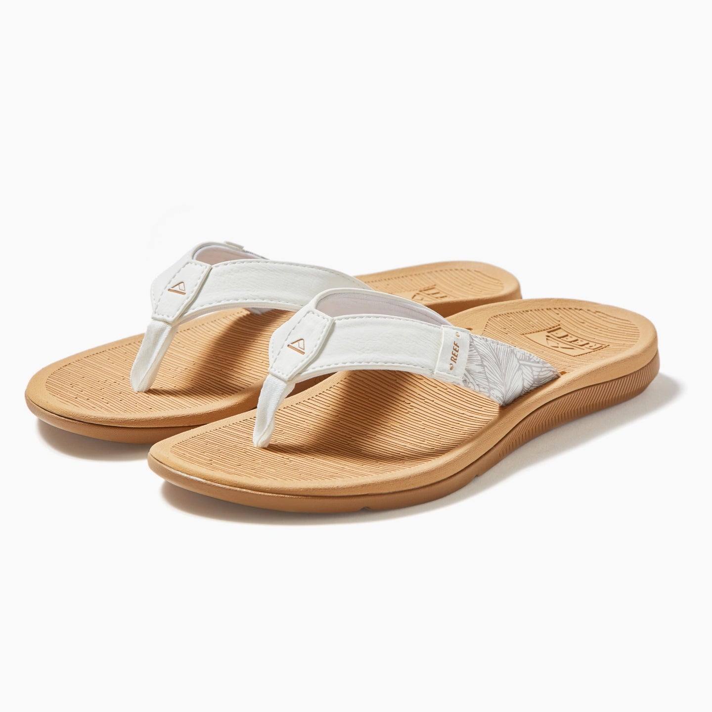 Santa Ana white flip flops facing left with cushioned footbeds, anatomical arch support, and water friendly materials