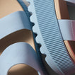 Close-up of the bottom and side of the Water Vista Higher sandal facing downward showing durable ridged sole and cushioned straps.