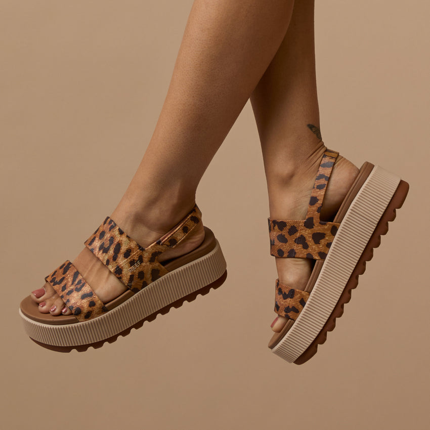 Side view of Women's Water Vista Higher sandals in leopard print with cushioned platform and anatomical arch support