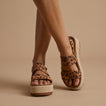 Front and side view of Water Vista Higher leopard print sandals for women, featuring cushioned platform soles and arch support.