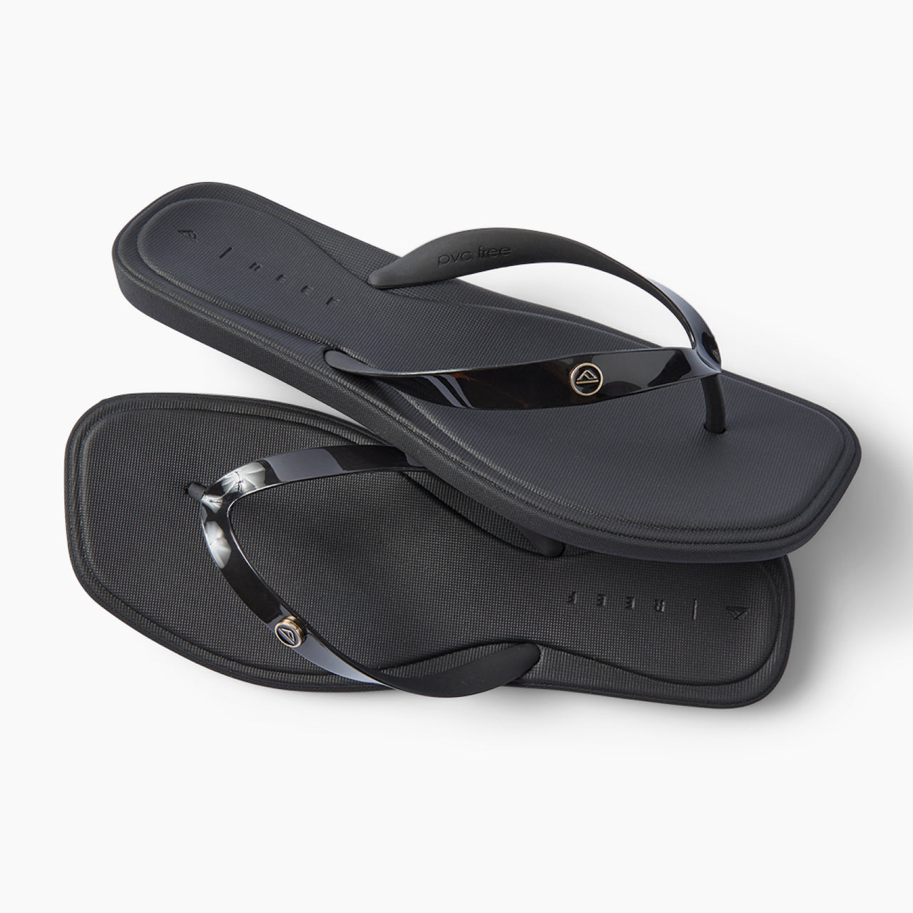 Solaye black water friendly flip flops facing right with sleek jelly straps and cushioned footbeds