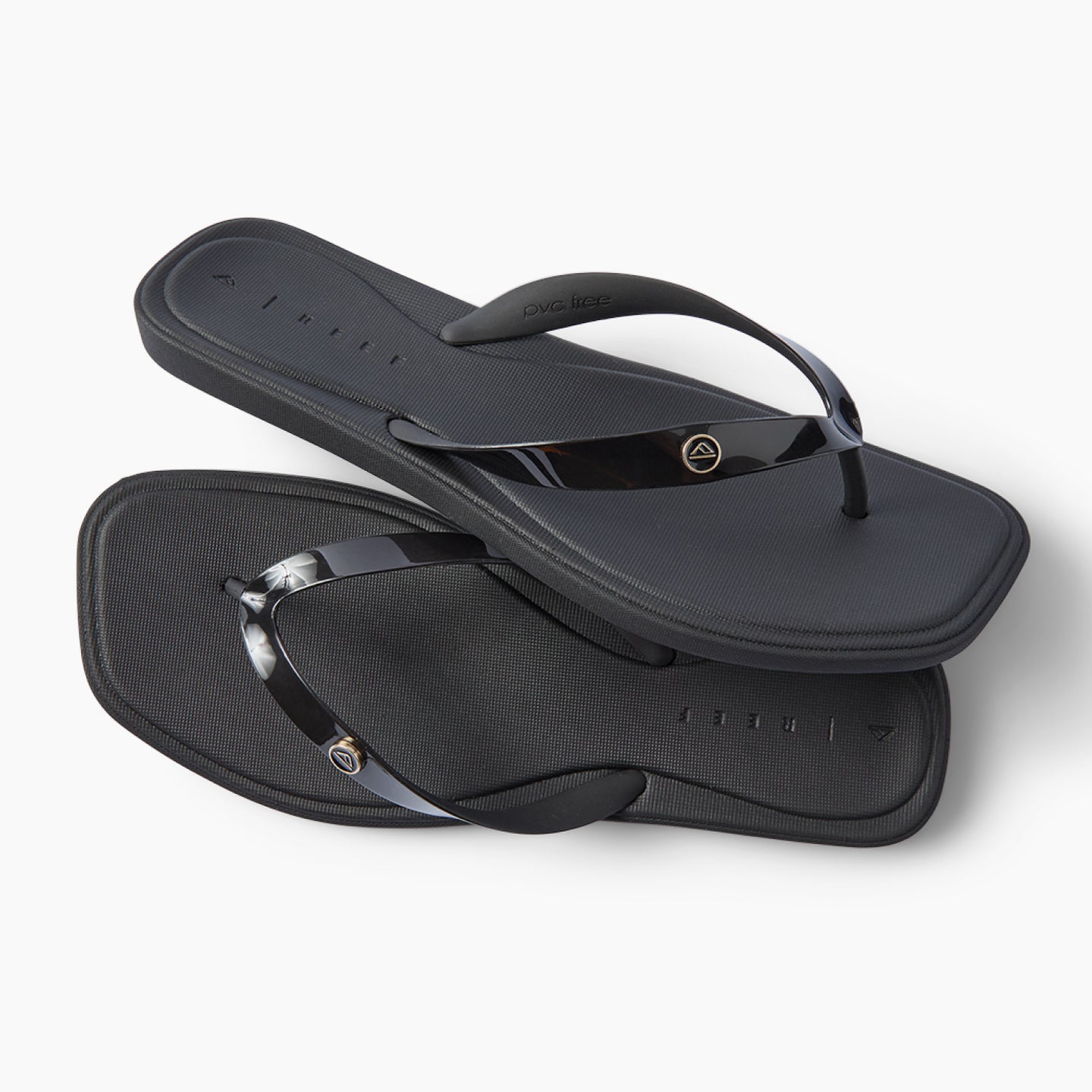 Solaye black water friendly flip flops facing right with sleek jelly straps and cushioned footbeds